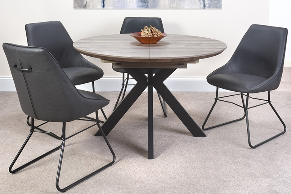 Walnut round top extending dining table